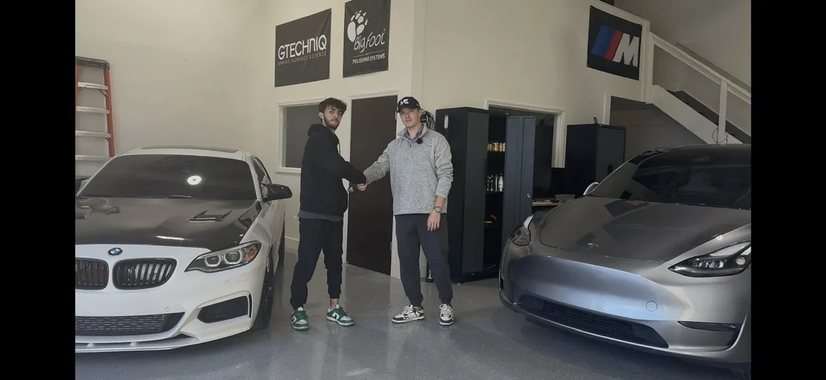 Nick and Alex from RPM Auto Lab shaking on a new working agreement