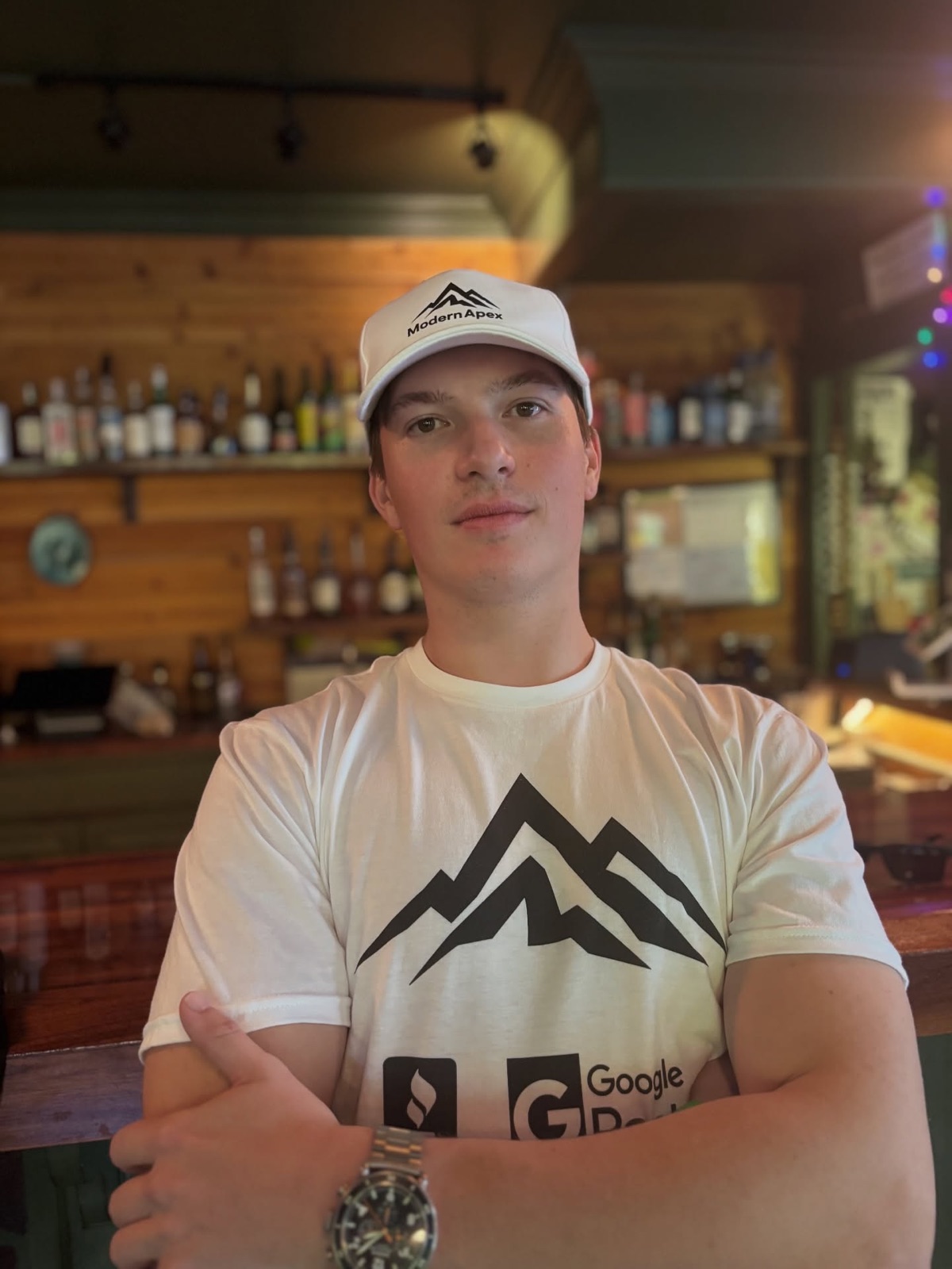 Nick in Modern Apex cap and Google Partner tee at a bar