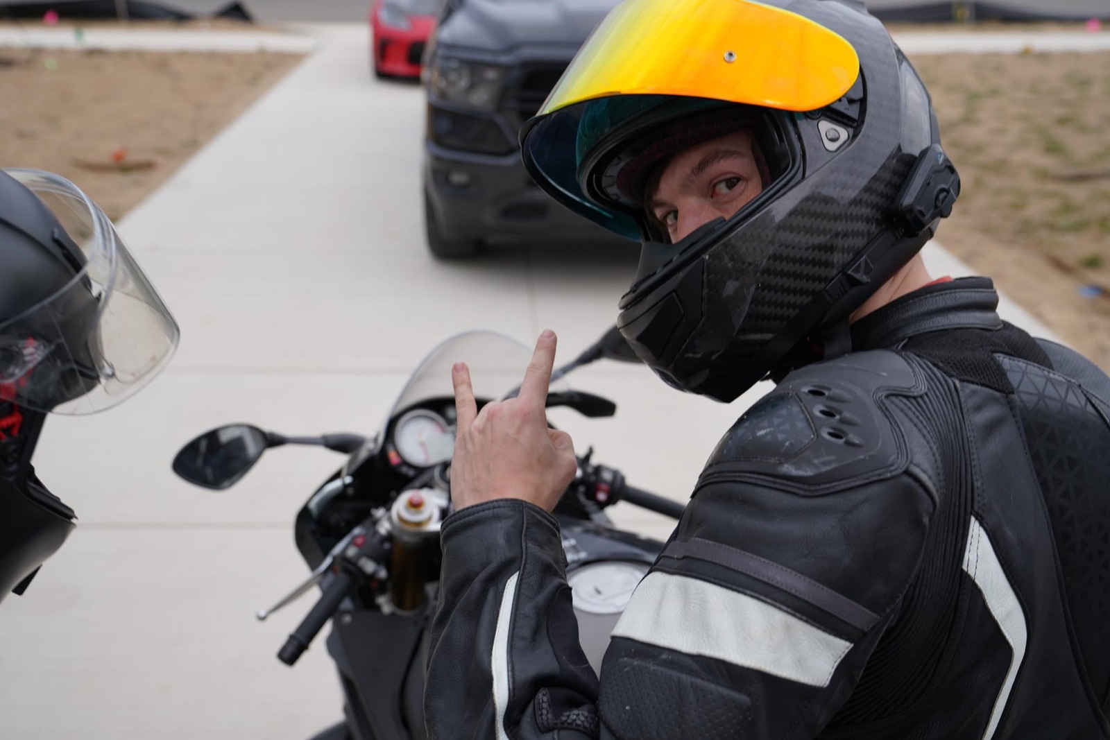 Nick in motorcycle gear on his bike